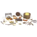 A collection of assorted archaeological and social history relics, including a piece of brick purpor... 