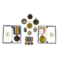 A group of military and sporting medals, comprising Victory and War medal, awarded to Private T Waug... 