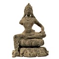Bronze staue of Buddha sitting in the teaching position on a lotus flower. Fine features on the face... 
