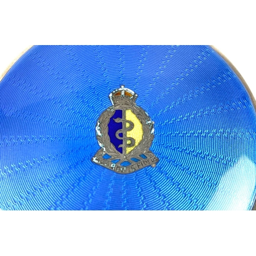 138 - A Royal Army Medical Corps silver and enamel compact, the top with blue guilloche enamel starburst f... 