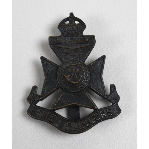 140 - A collection of British Army regimental badges, including Cornwall, Somerset and Cornwall, Paddingto... 