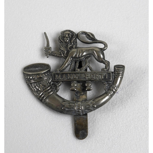 140 - A collection of British Army regimental badges, including Cornwall, Somerset and Cornwall, Paddingto... 