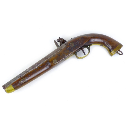 144 - An 18th century flintlock pistol, no visible maker's name, with walnut stock, white metal and brass ... 