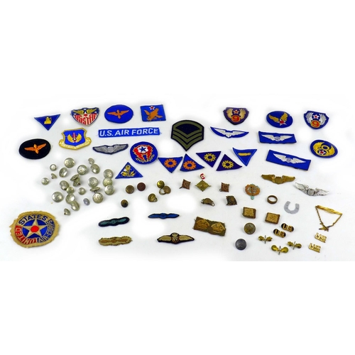 162 - A collection of over seventy WWI and later air force badges and buttons, including an WWI RFC cloth ... 