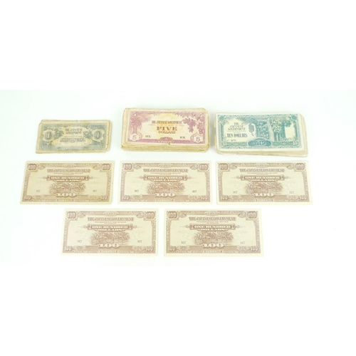 164 - A large quantity of WWII Japanese Dollar bank notes, comprising nine One Dollar notes, over 100 Five... 