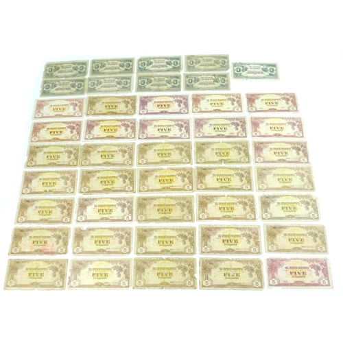 164 - A large quantity of WWII Japanese Dollar bank notes, comprising nine One Dollar notes, over 100 Five... 