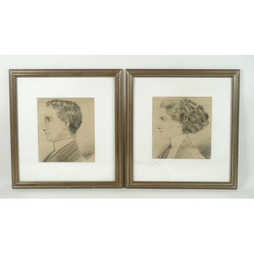 183 - A pair of Edwardian portraits in charcoal, depicting a lady and a young gentleman each in profile wi... 