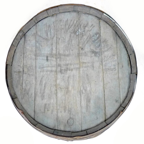 211 - A large oak coopered barrel with stopper hole and eight iron bands, a/f banding loose but still hold... 