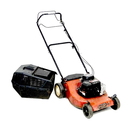 213 - A Champion 375 petrol lawnmower, with Briggs & Stratton engine, red with black grass box.
Notes: not... 