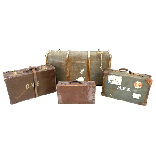 225 - A group of four vintage suitcases, the largest wooden bound and canvas covered, 51 by 91 by 31 cm hi... 