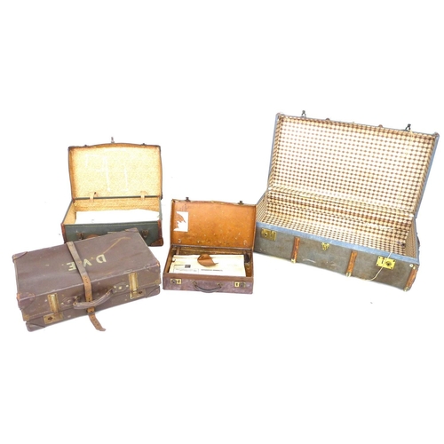 225 - A group of four vintage suitcases, the largest wooden bound and canvas covered, 51 by 91 by 31 cm hi... 