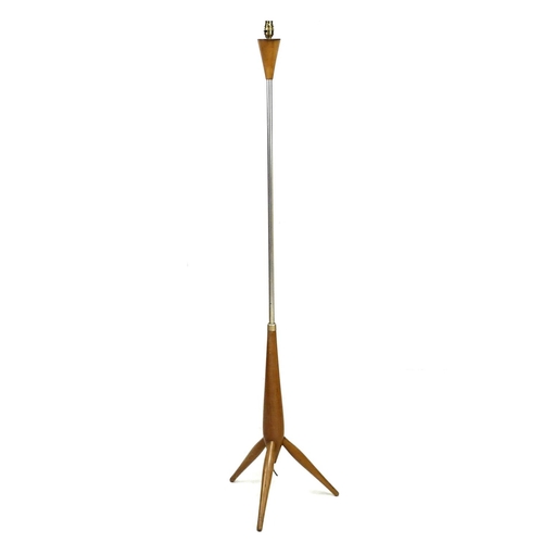 228 - A retro beech and tubular metal standard lamp, raised on tripod base, 40 by 40 by 158.5cm high.