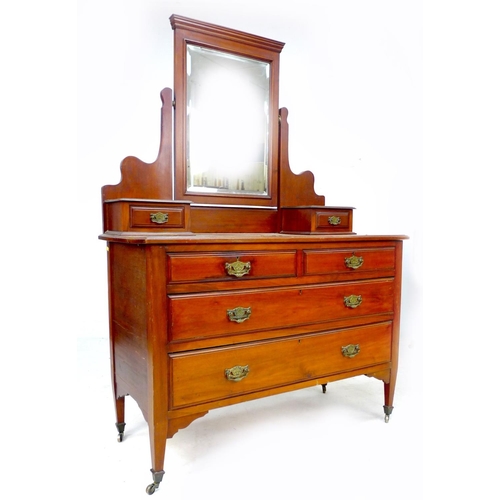 248 - An Edwardian mahogany dressing chest, with mirror top and two over two drawers, 107 by 52 by 156cm h... 