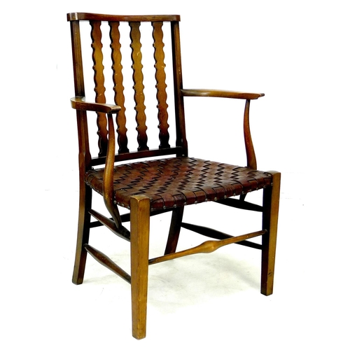 249 - A mahogany open armchair, circa 1940, with four shaped splats, the seat formed of lattice woven stri... 