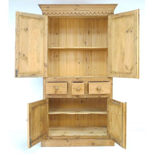 257 - A modern pine cupboard, in Victorian style, with twin cupboard doors opening to reveal a single shel... 