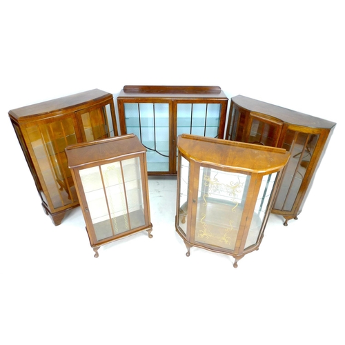 265 - A group of five vintage glazed display cabinets, 1940's to 1960's, most with glass shelves, 60 by 29... 