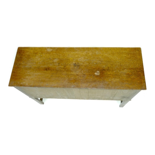 273 - An Old Charm dark stained sideboard, with carved decoration, two central drawers flanked by two cupb... 