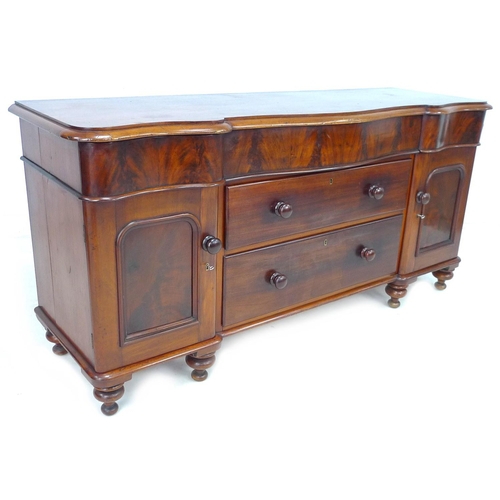 287 - A Victorian mahogany sideboard, with serpentine front, drawers flanked by two cupboards enclosing sh... 