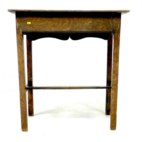 288 - A Georgian oak low boy, with single drawer above a shaped apron, raised upon square sectioned legs w... 