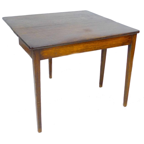 290 - A 19th century oak tea table, with kick leg action, 91 by 44 by 73.5cm high.