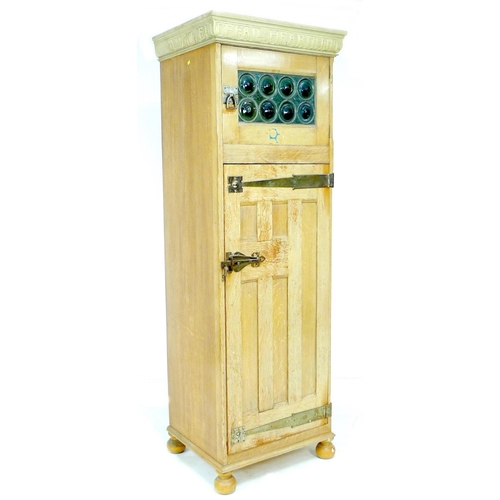 295 - A Liberty style oak Arts & Crafts single wardrobe, with motto to cornice 'WELL BEFALL HEARTH AND HAL... 