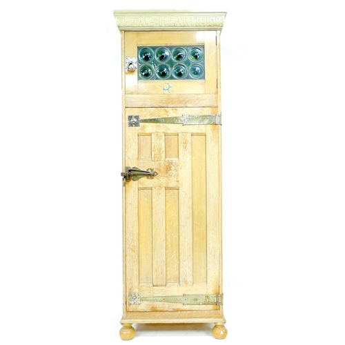 295 - A Liberty style oak Arts & Crafts single wardrobe, with motto to cornice 'WELL BEFALL HEARTH AND HAL... 