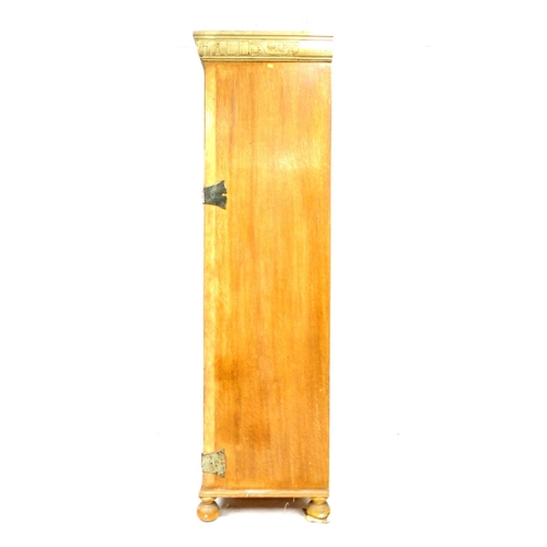 295 - A Liberty style oak Arts & Crafts single wardrobe, with motto to cornice 'WELL BEFALL HEARTH AND HAL... 