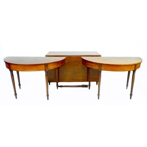 309 - An early Victorian mahogany D end dining table, circa 1840, with plain frieze, comprising central se... 