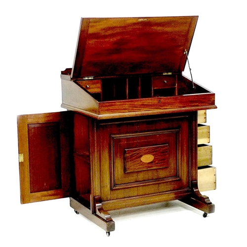 312 - An Edwardian mahogany and inlaid Davenport desk, with lift lid opening to reveal a fitted interior, ... 