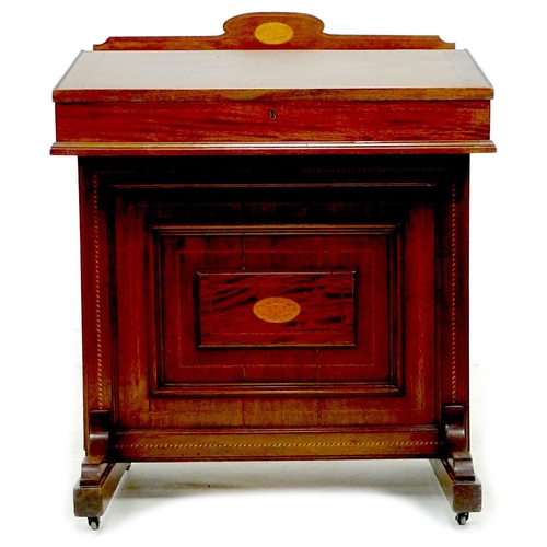 312 - An Edwardian mahogany and inlaid Davenport desk, with lift lid opening to reveal a fitted interior, ... 