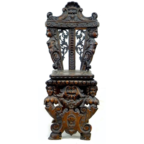 314 - A 19th century Italian Renaissance Revival carved fruitwood hall chair, being a later version of a '... 