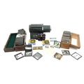 A large collection of vintage glass slides including some early 20th century photographic slides, in... 