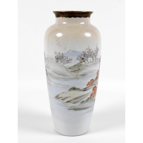 6 - A Japanese Satsuma pottery vase, decorated with a continuous landscape, cherry blossoms, trees and h... 