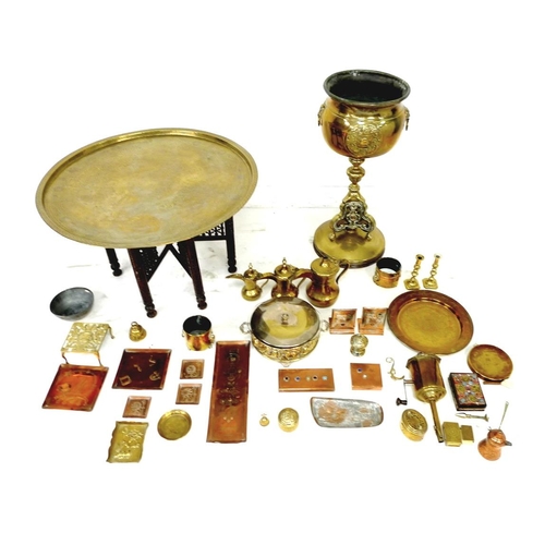 62 - A large collection of brass and metal wares, including a jardiniere stand, and a 'Benares' table, 83... 