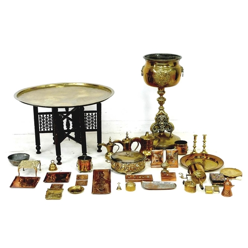 62 - A large collection of brass and metal wares, including a jardiniere stand, and a 'Benares' table, 83... 