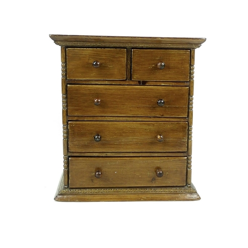 64 - A 19th century burr walnut tea caddy of sarcophagus form, bordered with Tunbridgeware inlay and boxw... 
