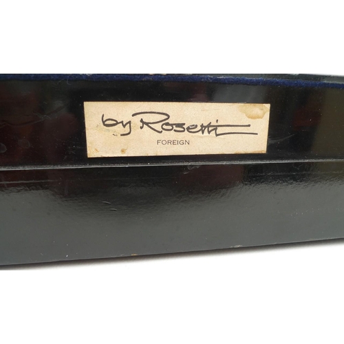 65 - A twelve bar Rosetti, German autoharp, painted black with roses to the board, 51 by 32cm, together w... 