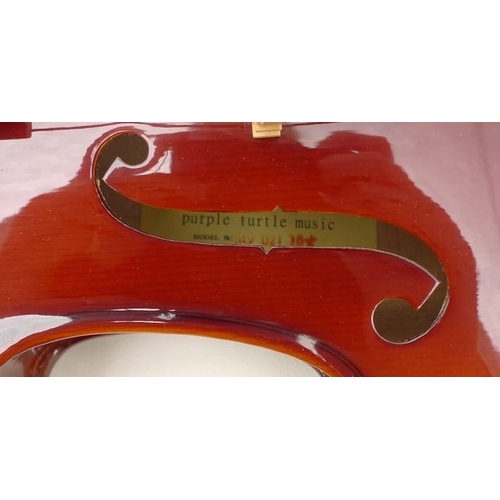 66 - A sixteen inch Purple Turtle viola, model number MV 021 16+, total length 67cm, by 23.5cm, with bow,... 