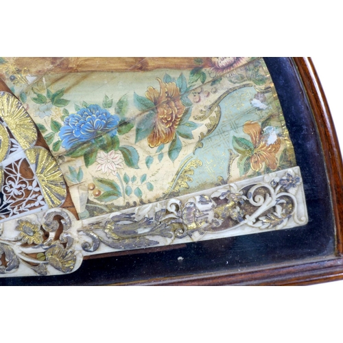 71 - A French or Italian gouache, paper and ivory mounted fan, mid 18th century, the leaf painted with a ... 