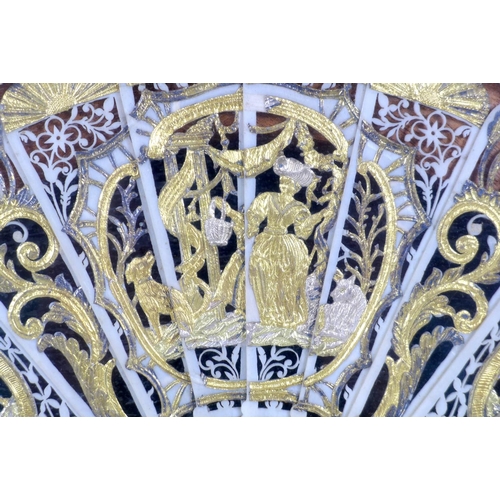 71 - A French or Italian gouache, paper and ivory mounted fan, mid 18th century, the leaf painted with a ... 