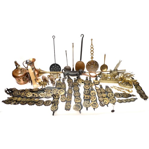 221 - A collection of brass and copper items, including horse brasses, animal sculptures, a pair of silver... 