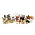 A large collection of over sixty pachyderm figurines, including a white ceramic elephant with indist... 