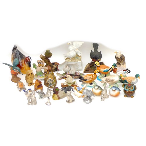 16 - A collection of over thirty bird figurines, including five Brixworth Pottery ducks, largest 12.5 by ... 