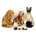 A group of five china feline figurines, comprising three Siamese cats, largest, a/f, 22 by 16 by 42.... 