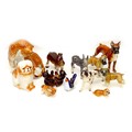 A group of twelve West German and Russian china animal figurines, including dogs, bears, and a leopa... 