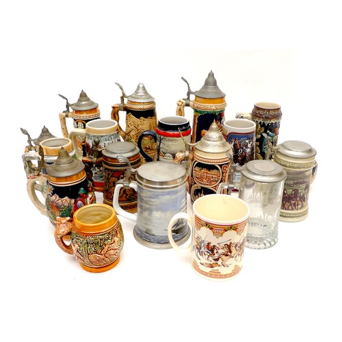 19 - A collection of modern drinking steins, with moulded and printed decoration, most with metal hinged ... 