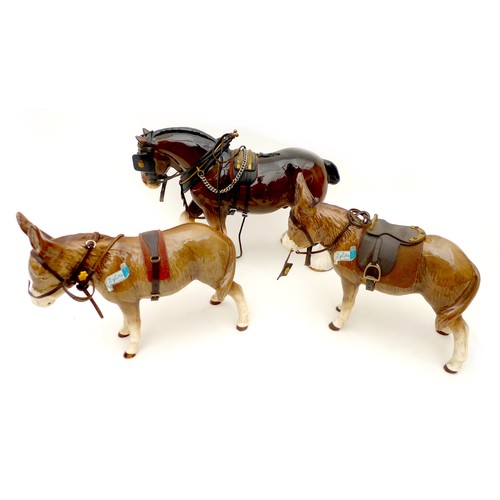 10 - Two Sylvac donkeys and a Sylvac horse, 34 by 10 by 24cm high. (3)