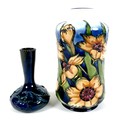 A Moorcroft limited edition vase, of tall waisted form, decorated in the Spiraxia pattern, designed ... 