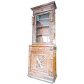 A late 19th century Continental oak bookcase, profusely carved with figures, leaves, and swags, with... 