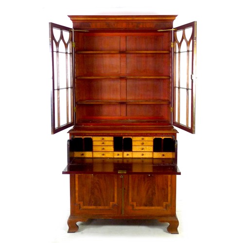 352 - A George III mahogany, crossbanded, and inlaid secretaire bookcase, raised on ogee bracket feet, 110... 